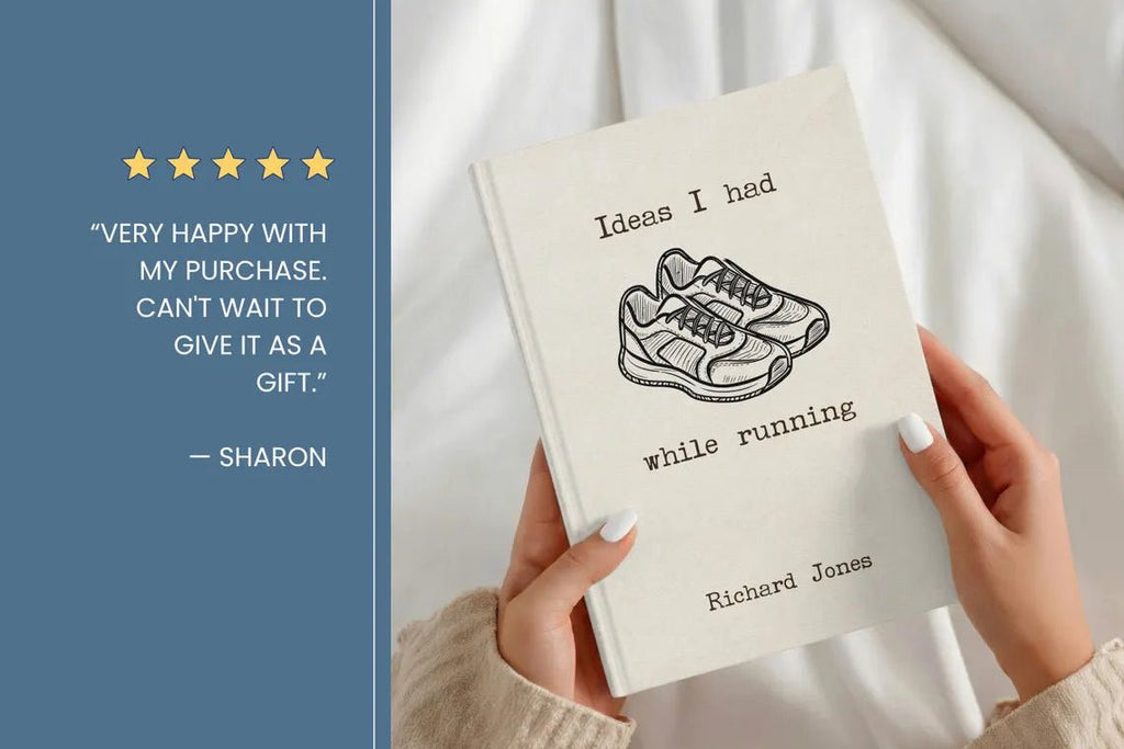 A person holds a cream-colored hardcover book titled 'Ideas I had while running' by Richard Jones. The book cover features a simple black line drawing of running shoes.